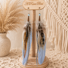 Load image into Gallery viewer, Periwinkle Skies &amp; Rhinestone Bows Feather Earrings
